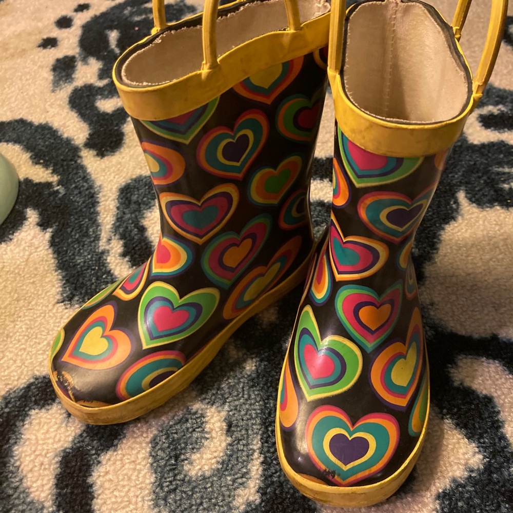 Little kid’s yellow rain boots